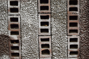 Stack of cinder blocks with textured filler